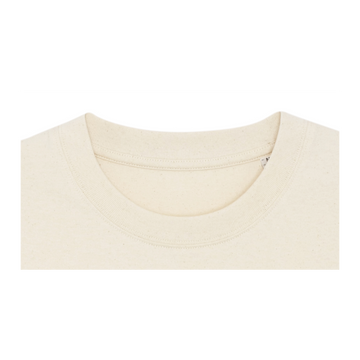 Close-up view of a beige crew neck T-shirt made from organic cotton, showcasing the neckline details and stitching. This Stanley/Stella STTU788 Stanley/Stella Freestyler Heavy Organic Cotton Unisex T-Shirt features fine single jersey fabric, ensuring both comfort and durability.