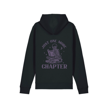 A Stanley/Stella STSU168 Drummer 2.0 Hoodie Black (C002), made from recycled polyester and organic cotton, featuring a black design with the phrase "Just One More Chapter" and a skeleton reading a book printed on the back.