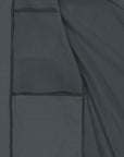 Close-up of a dark gray fabric showing details of pockets and stitching on a MyNeedsAreSimple STJM167 Stanley/Stella Navigator Men's Non-Hooded Softshell jacket.