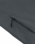 Close-up of a black zipper on a water repellent, dark MyNeedsAreSimple softshell fabric, displaying the zipper pull and teeth details of the STJM167 Stanley/Stella Navigator Men's Non-Hooded Softshell.