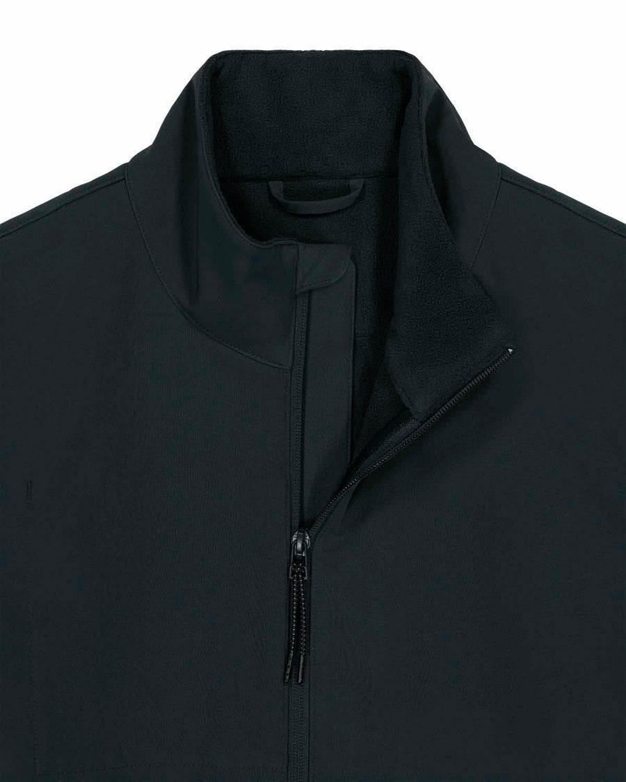 Close-up of a MyNeedsAreSimple black water-repellent STJM167 Stanley/Stella Navigator Men's Non-Hooded Softshell zip-up jacket with a high collar, focusing on the upper chest and collar area.