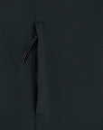 Close-up view of a black zipper partially open on a MyNeedsAreSimple STJW166 Stanley/Stella Navigator Women’s Non-Hooded Softshell fabric background, showing the texture details.