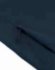 Close-up of a black zipper on a dark blue MyNeedsAreSimple STJW166 Stanley/Stella Navigator Women’s Non-Hooded Softshell fabric.