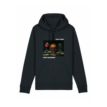 The black Stanley/Stella STSU168 Drummer 2.0 Hoodie Black (C002), crafted from recycled polyester and organic cotton, features a printed image of a skull next to a candle and hourglass. Text on the hoodie reads "Hate Today, Gone Tomorrow.