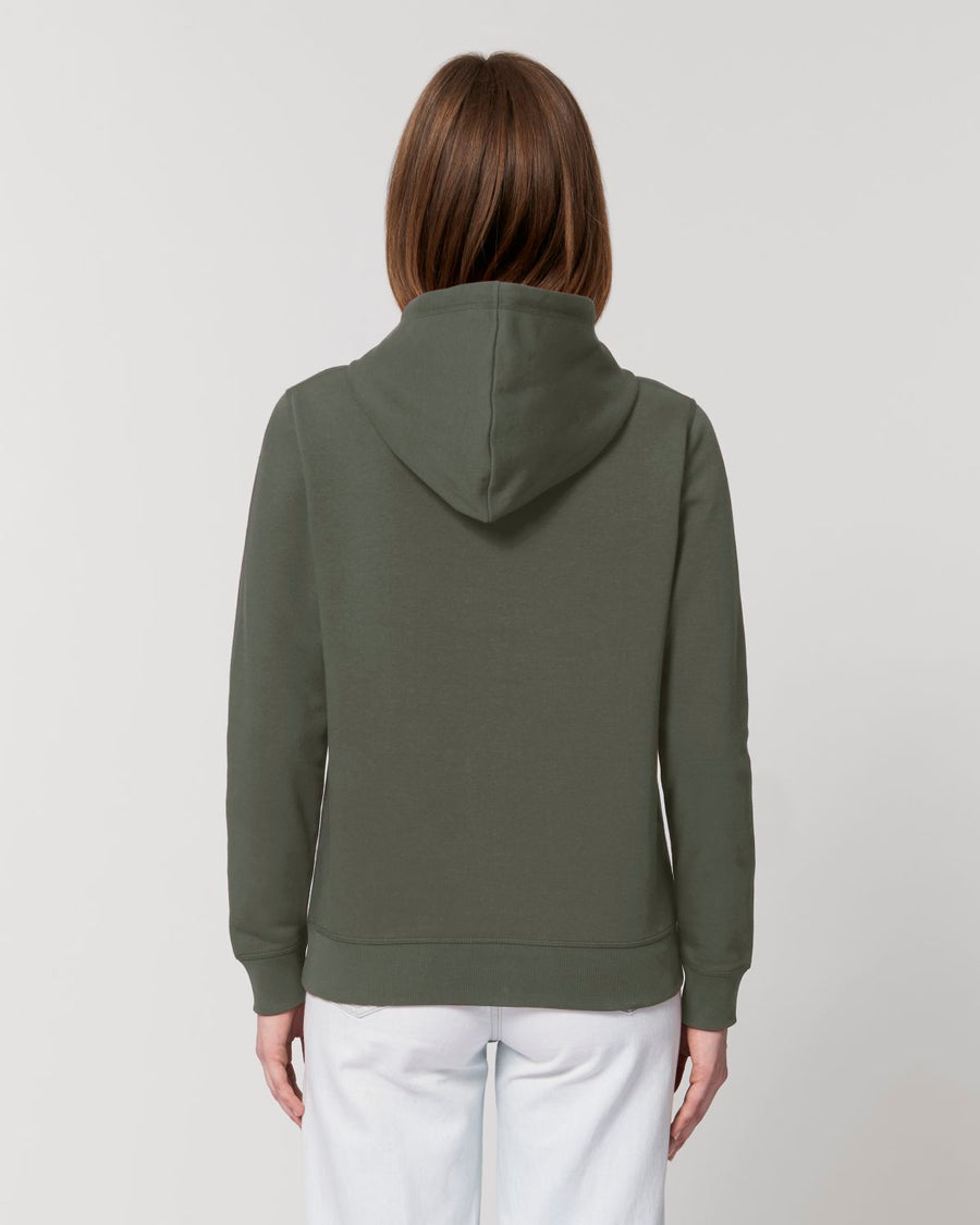 The back view of a woman wearing a green Stanley/Stella Drummer Hoodie Khaki (C223).