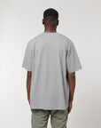 The back view of a man wearing a Stanley/Stella STTU788 Freestyler Heavy Organic Cotton Unisex T-shirt.