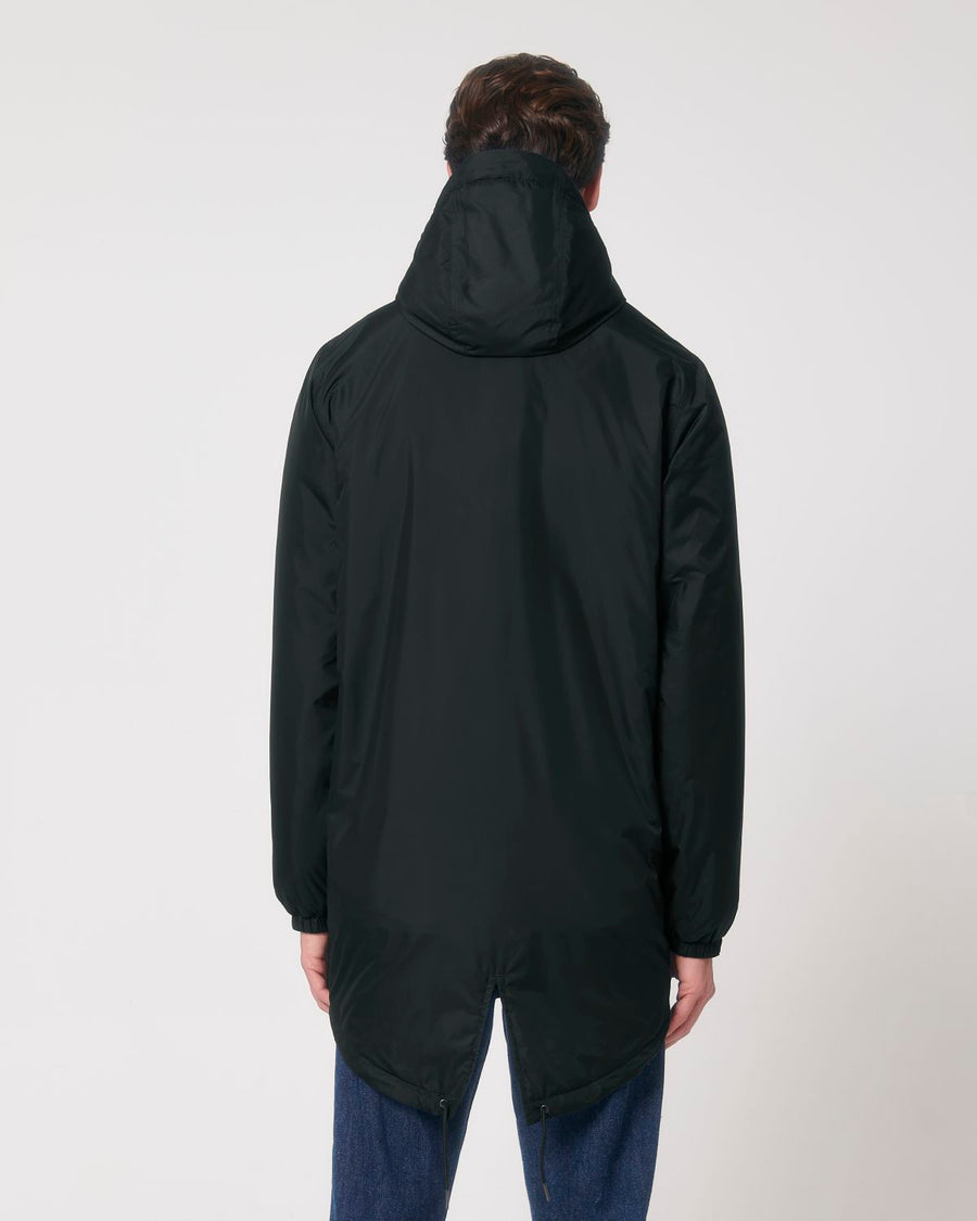 The back view of a man wearing a STJU841 Stanley/Stella Padded Parka.