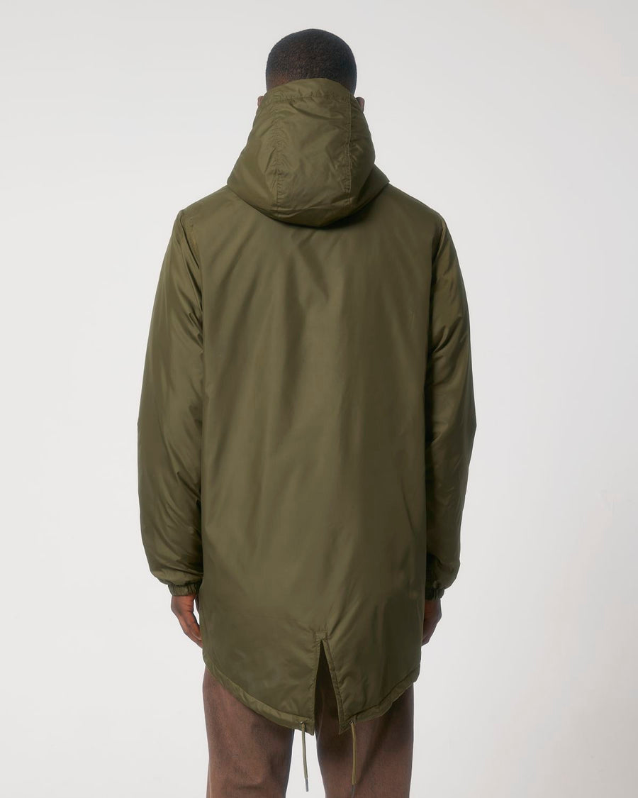 The unisex back view of a man wearing a green STJU841 Stanley/Stella Padded Parker Jacket.