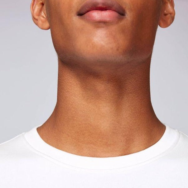A neck view of a Stanley/Stella white eco-friendly Sweatshirt worn by a male model