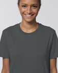 A female model wearing an organic anthracite Stanley/Stella rocker T-Shirt