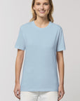 A female model wearing an organic sky blue Stanley/Stella rocker T-Shirt