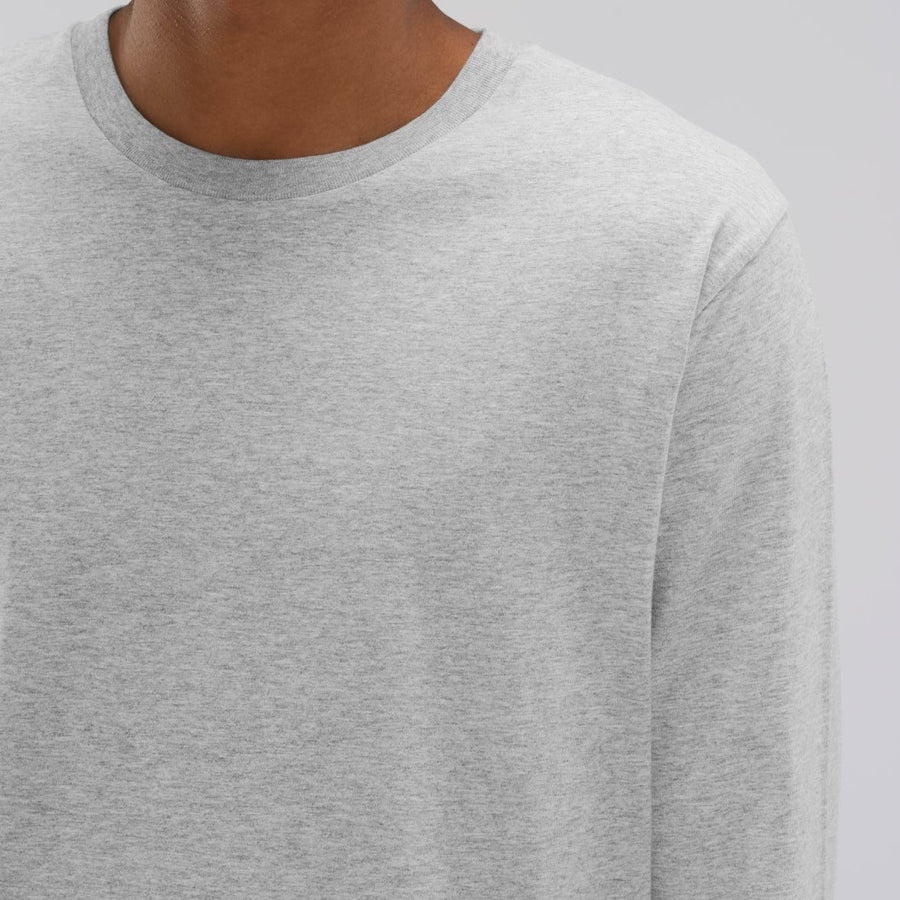 A model wearing a Heather grey Stanley/Stella Shuffler organic cotton long sleeve T-Shirt