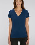 A female model wearing a Stanley/Stella Ladies heather blue evoker v neck T-Shirt