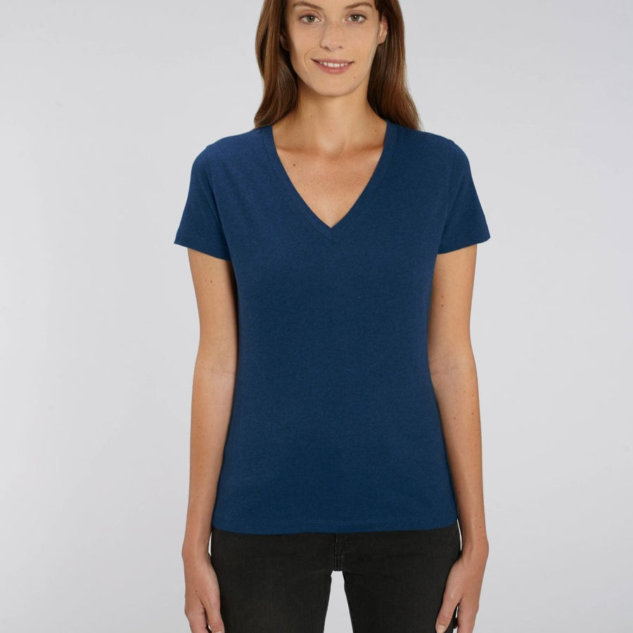 A female model wearing a Stanley/Stella Ladies heather blue evoker v neck T-Shirt