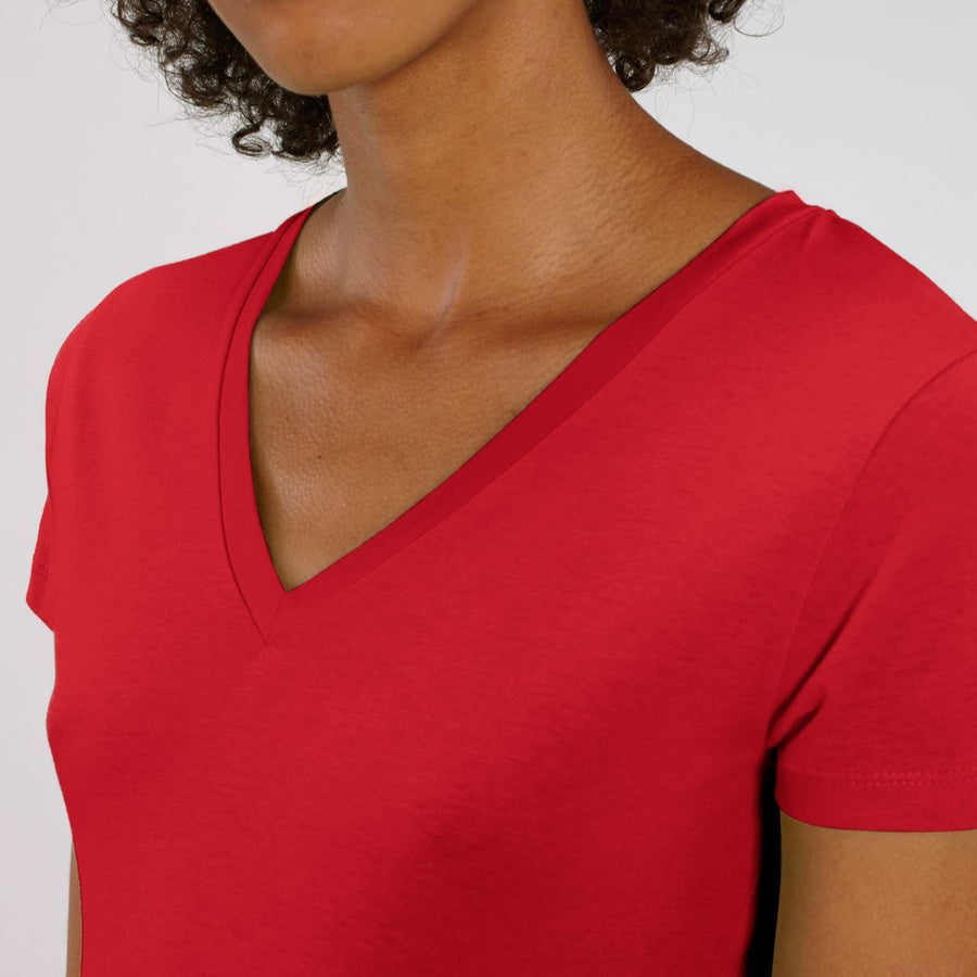 A female model wearing a Stanley/Stella Ladies red evoker v neck T-Shirt