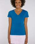 A female model wearing a Stanley/Stella Ladies royal blue evoker v neck T-Shirt